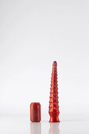 A small tentacle dildo in red.