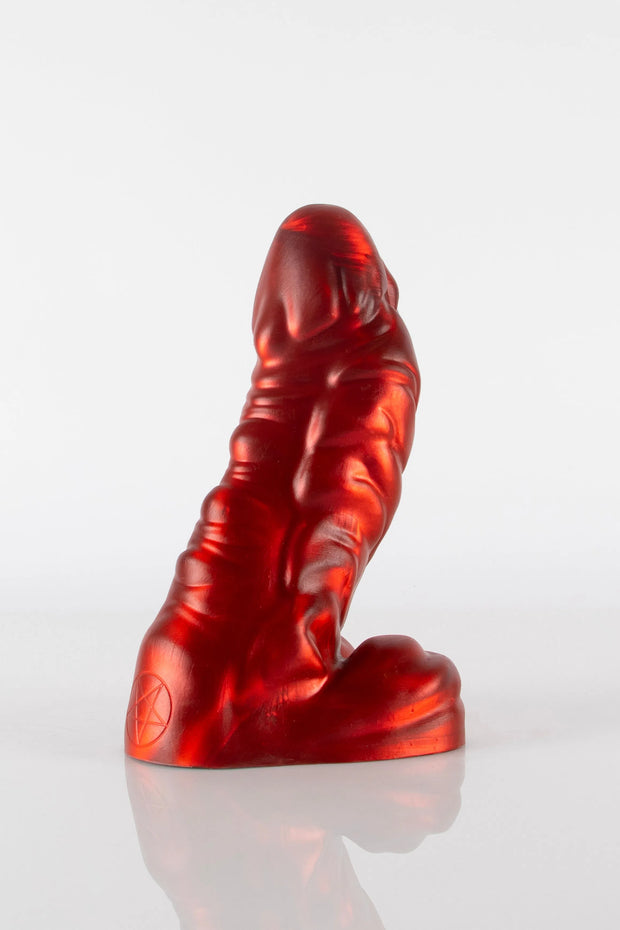 A product photo of a red dragon dildo.