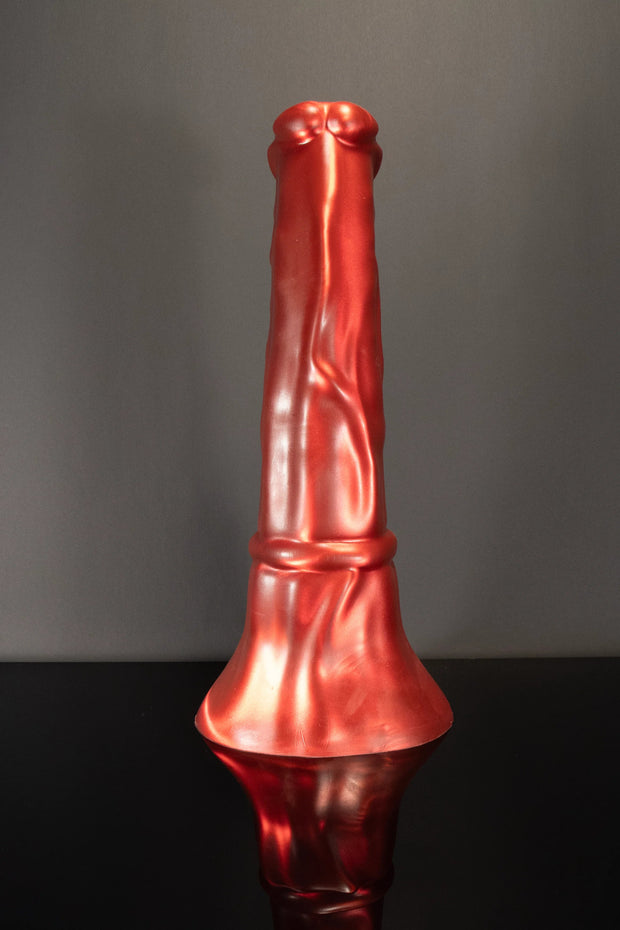 A front on facing product photo of a red horse didlo showing a flared base and veins.