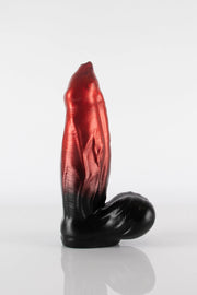 A product photo of a demon dildo showing off veins.