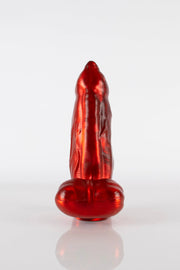 A front on photo of a demon dildo.