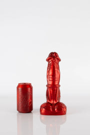 A small red Pegasus Dildo.