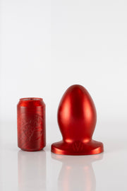 An 11 inch red silicone butt plug.