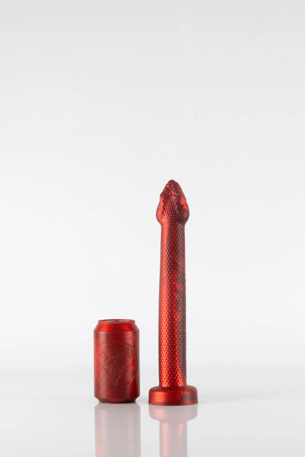 A product photo of a small red snake dildo.