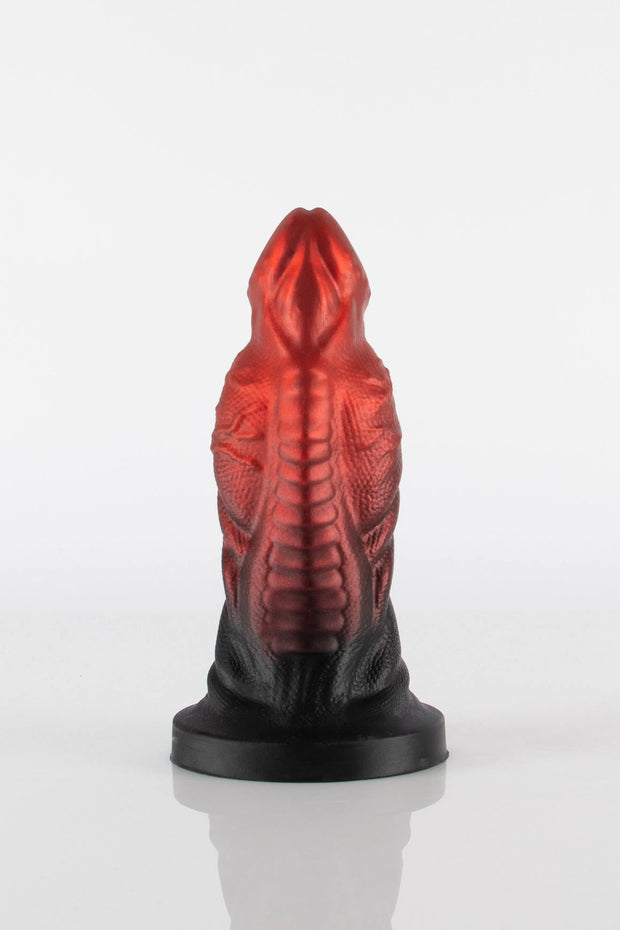 A product photo of a reptile dildo taken from the front.